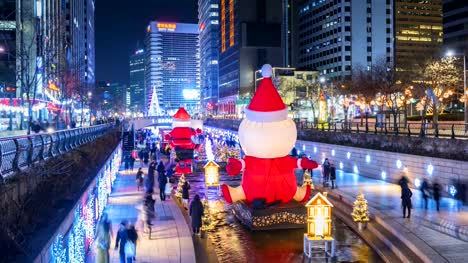 Timelapse-at-Cheonggyecheon-Stream,People-walking-on--Beautiful-Christmas-Light-at-night-in-Seoul,-South-Korea,-4K-Time-lapse