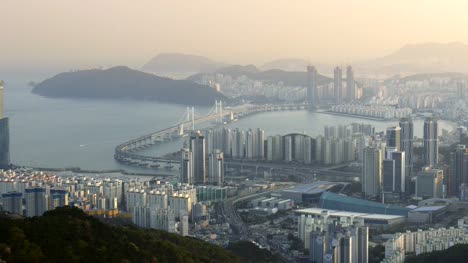 Busan,-South-Korea.-Panning-view-of-city-center-in-morning-lights.-4K