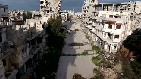 Aerial-view-of-ruined-homs-under-cloudy-sky
