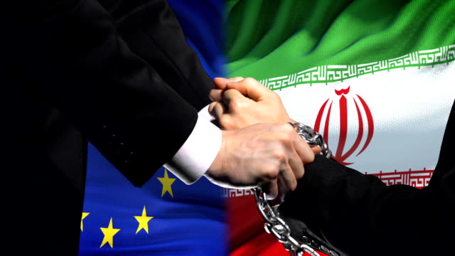 European-Union-sanctions-Iran,-chained-arms,-political-or-economic-conflict