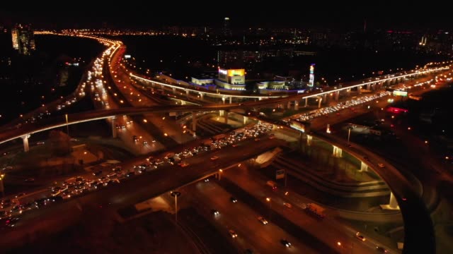Aerial-Transport-road-junction.-Modern-city-traffic-road-at-night.-Transport-road-junction.