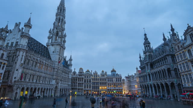 Grand-Place-Grote-Markt-de-Bruselas-día-a-noche-lapso-de-tiempo-en-Bruselas,-Bélgica.