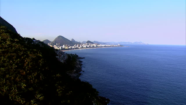 Flying-around-southern-Rio-de-Janeiro,-Brazil-towards-Ipanema-Beach