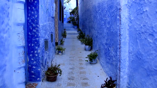 POV,-walking-in-blue-town-Chefchaouen-Chaouen-/-Morocco,-first-point-of-view