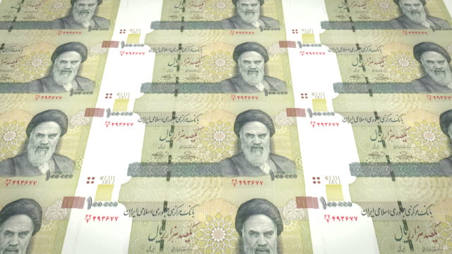 Billetes-de-100-mil-riales-iraníes-de-Irán,-dinero-en-efectivo,-lazo