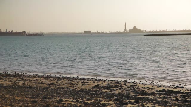 Puesta-de-sol,-mar-y-Mezquita