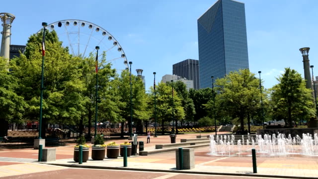 Atlanta-Centennial-Olympic-Park-Motion-Time-Lapse-with-sky-view-Ferris-wheel