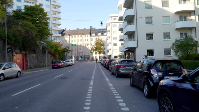 Cars-parking-on-the-street-side-of-Stockholm-in-Sweden
