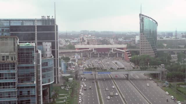 View-of-the-bustling-upcoming-commercial-and-regional-capital-of-India-part-of-the-Delhi-NCR,-with-many-business-and-corporate-houses-and-their-national-headquarters-in-contemporary-buildings