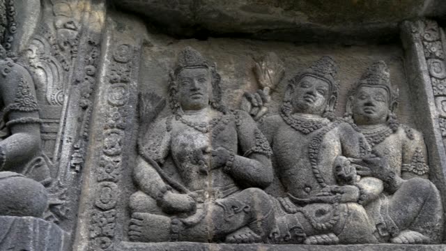 Bas-relief-inside-Prambanan-temple-complex.-Yogyakarta,-Central-Java,-Indonesia.-Crane-shot