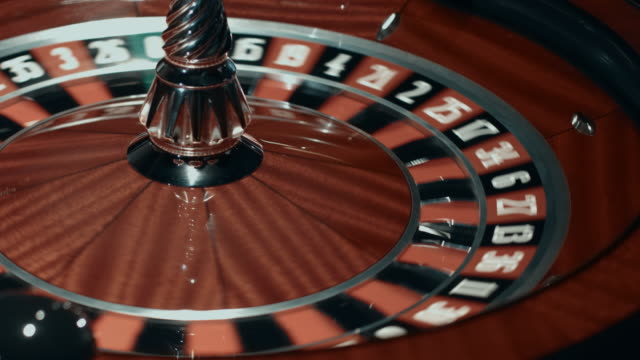 Spinning-roulette-wheel-with-stopped-ball.-Close-up-classic-casino-roulette