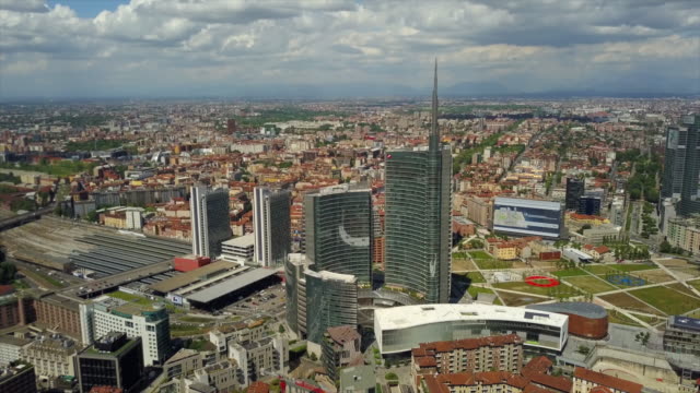 sunny-day-milan-city-downtown-district-aerial-panorama-4k-italy