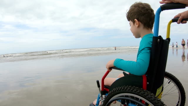 childlike-wheelchair-horizon-sand