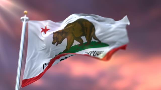 Flag-of-California-state,-region-of-the-United-States,-waving-at-sunset---loop