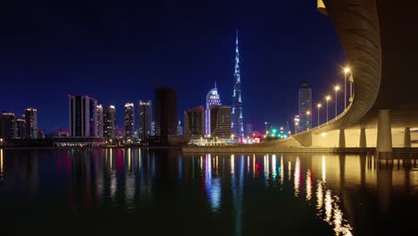 night-illumination-dubai-world-highest-building-bay-panorama-4k-time-lapse-united-arab-emirates