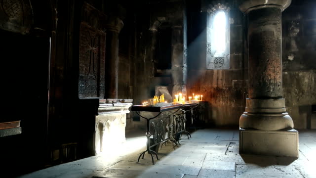Armenian-apostolic-church.-Light-falling-inside-the-Geghard-monastery-in-Yerevan,-Armenia.