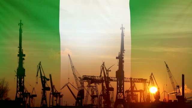 Industrial-concept-with-Nigeria-flag-at-sunset