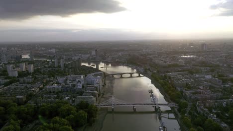 Aerial-View-of-London-Urban-Cityscape-and-Battersea-Bridge-on-Thames-River