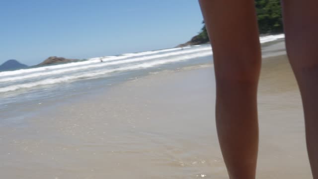 Woman-walking-in-Brazilian-Beach