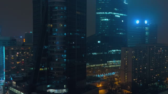Drone-footage-of-modern,-glazed-skyscrapers-in-in-the-center-of-Warsaw