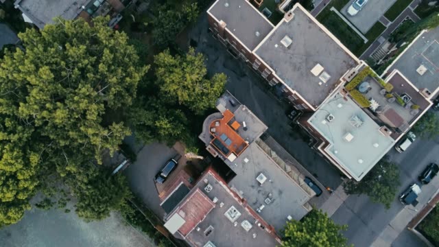 Aerial-footage-of-Montreal-during-a-hazy-summer-day-looking-down