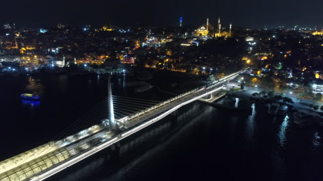 Aerial-View-Of-Old-Town-Over-Tram-Bridge-And-Suleymaniye-Mosque-Istanbul-Night