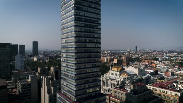 Latin-American-Tower-and-Palace-of-Fine-arts-view-with-drone,-Mexico-City,-CDMX