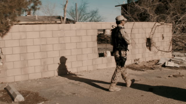 Soldier-Patrolling-Rundown-Neighborhood