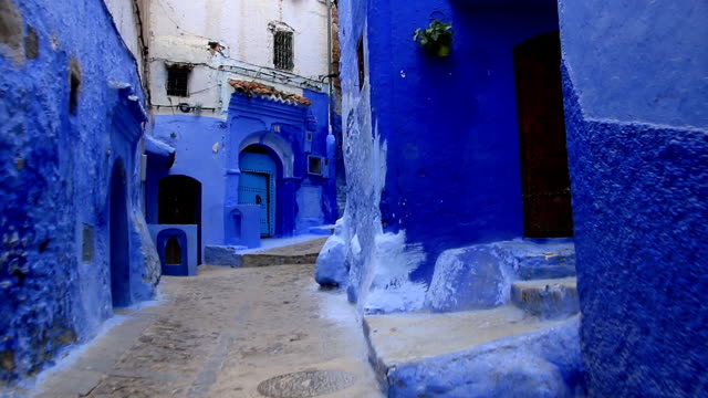 POV,-walking-in-blue-town-Chefchaouen-Chaouen-/-Morocco,-first-point-of-view