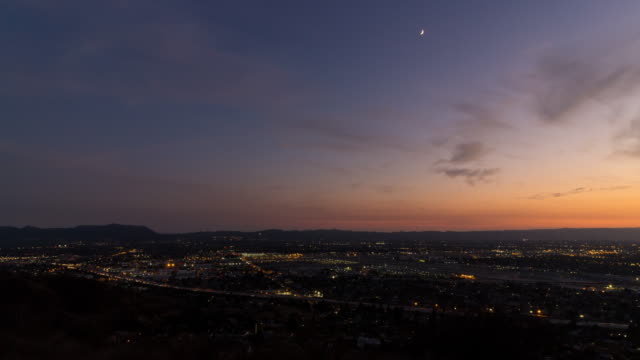 Burbank-Airport-and-North-Hollywood,-California-Day-To-Night-Timelapse