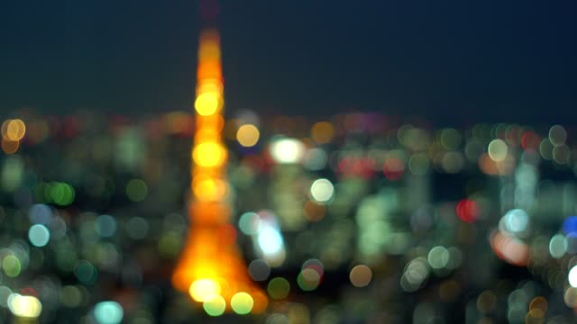 abstract-background-of-tokyo-city-with-tokyo-tower-illuminated-at-night