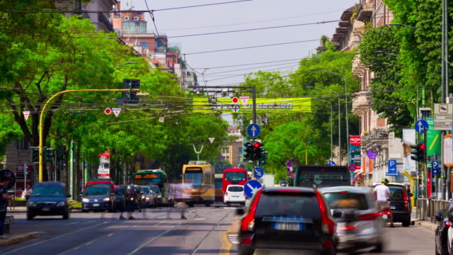 Italy-milan-city-sunny-day-tram-traffic-street-panorama-4k-timelapse