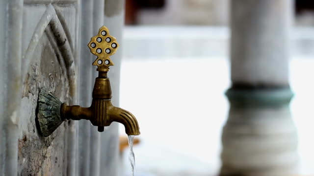 old-authentic-iron-faucet-in-the-mosque