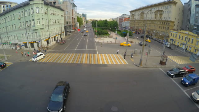 4k-timelapse-of-crosswalk-with-people-and-cars