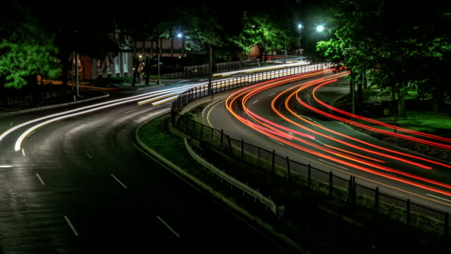 Boston-Traffic-Timelapse-at-Night.--Busy-City-Motion-along-Storrow-Drive,-Downtown.
