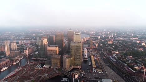4K-Aerial-Footage-Above-The-Towers-Of-London's-Financial-District,-Canary-Wharf