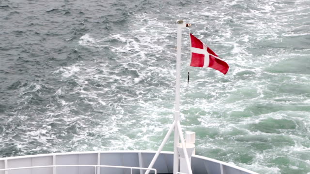 Danish-flag-fluttering-in-the-wind-on-the-ship