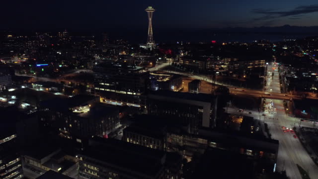 Seattle,-WA-Circa-2017:-Aerial-Panning-Up-to-World-Famous-Space-Needle-at-Night