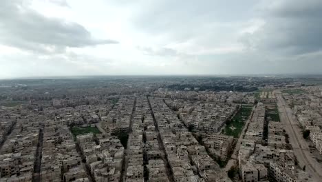 Panorama-of-ravaged-Aleppo-after-war,-under-cloudy-sky