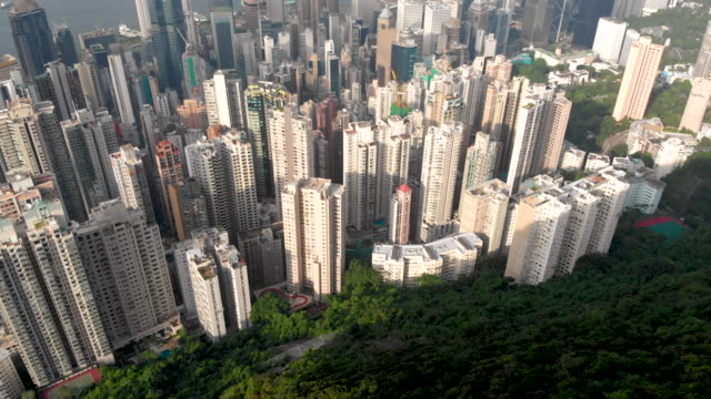Aerial-tilt-up-shot-of-Hong-Kong-skyline