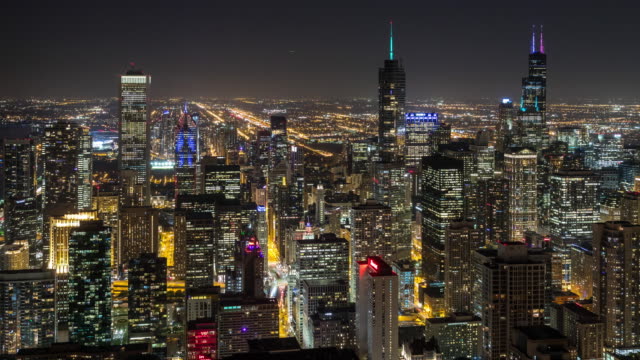 Downtown-Chicago-Skyscrapers-at-Night-Aerial-Timelapse