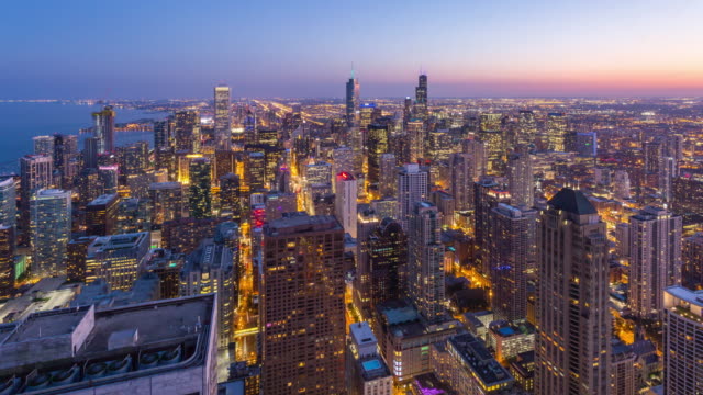 Downtown-Chicago-Aerial-Day-to-Night-Sunset-Timelapse
