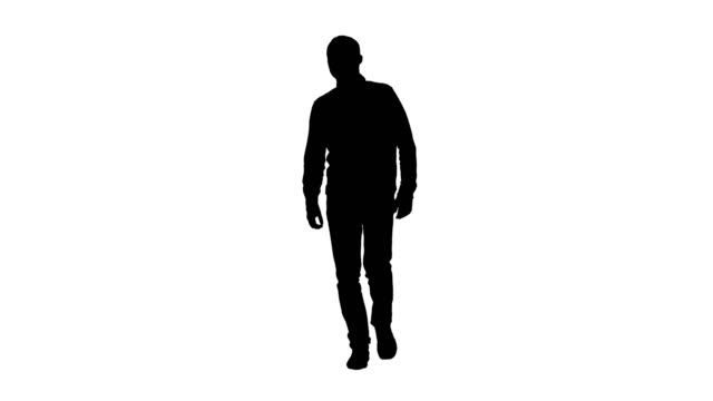 Silhouette-Young-man-walking-in-a-good-mood