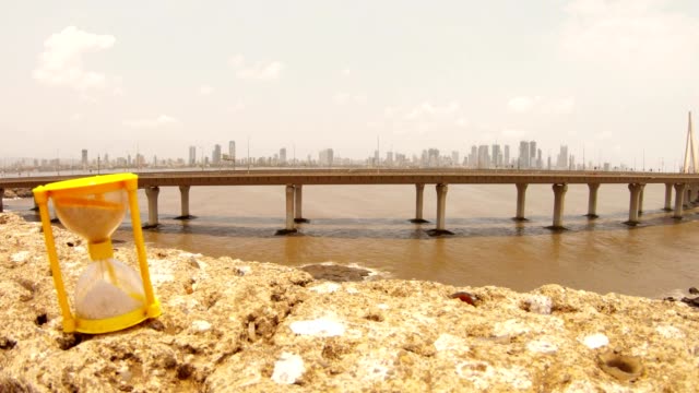 Bandra-Worli-Sea-Link-Mumbai-in-front-small-sandglass-time-goes