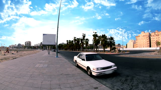 Street-in-Jeddah-with-palm-trees-at-day