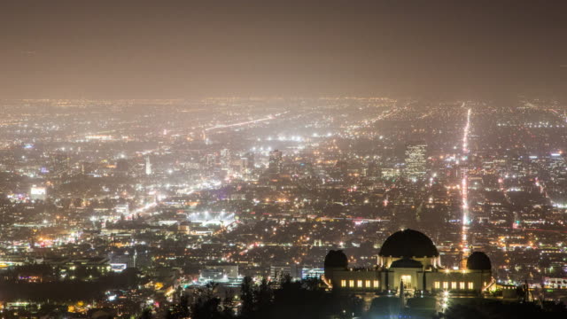 Griffith-Park-Observatory-and-the-Long-Streets-of-Los-Angeles-Skyline-at-Night:-Timelapse
