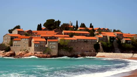 Island-of-Sveti-Stefan,-close-up-of-the-island-in-the-afternoon