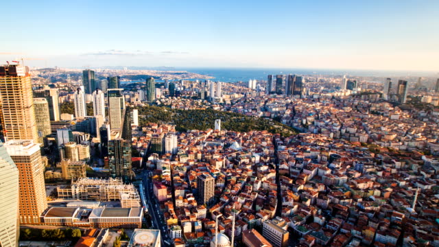 Zoom-out-timelapse-rooftop-view-of-Istanbul-business-district-and-Golden-horn