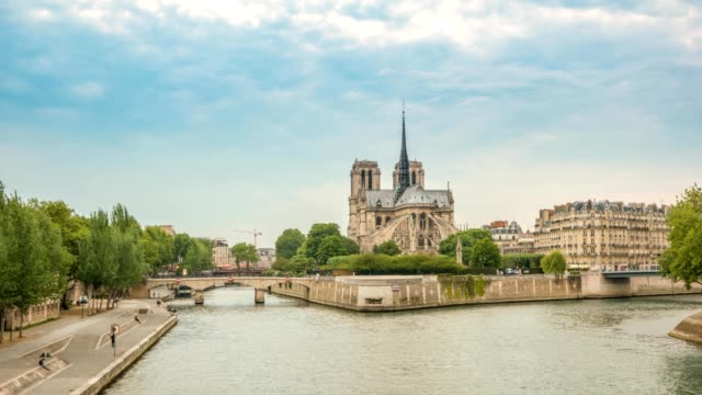 Paris-city-skyline-day-to-night-timelapse-at-Notre-Dame-de-Paris-Cathedral-and-Seine-River,-Paris,-France-4K-Time-lapse