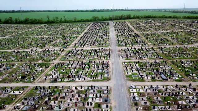 An-aerial-over-a-vast-cemetery-of-headstones-honors-veterans